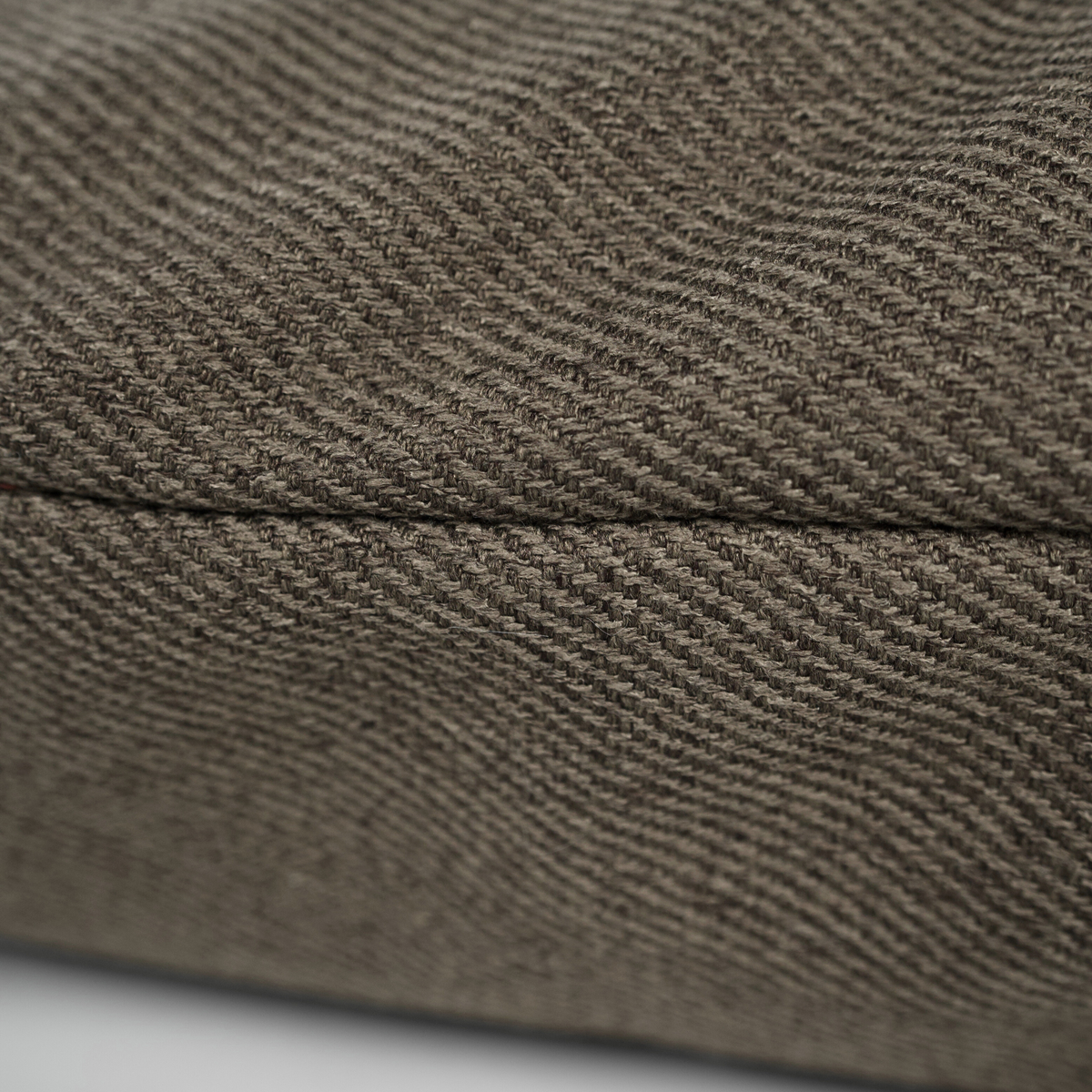 Close-up van de Herringbone-stof en de naad op een hondenkussen
