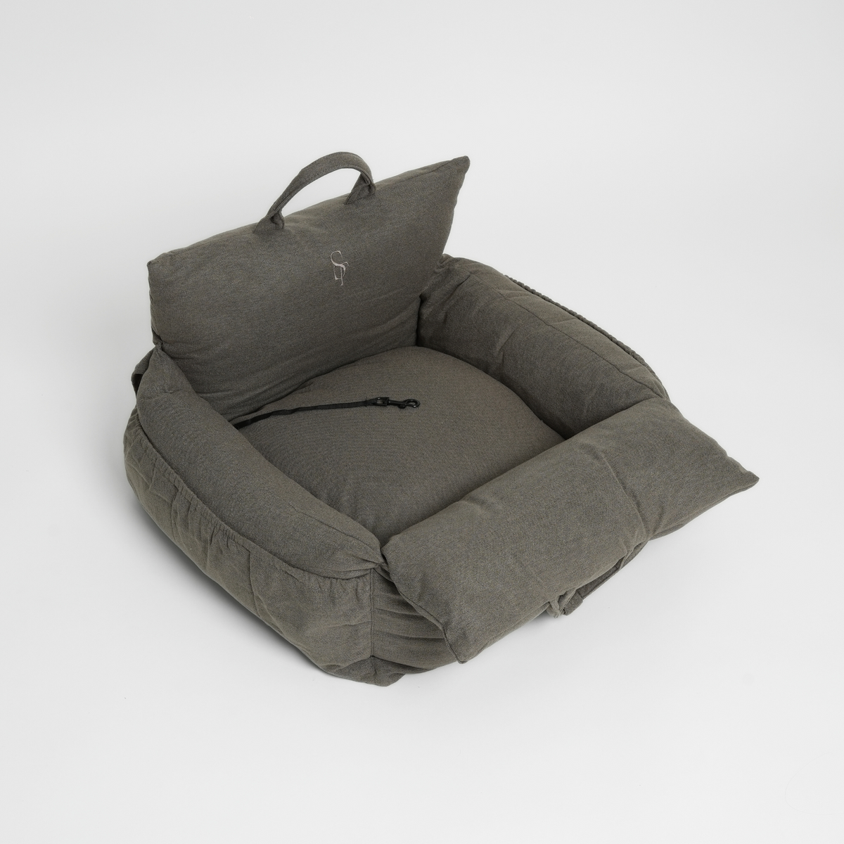 Moss green dog car seat seen at an angle with its carry handle